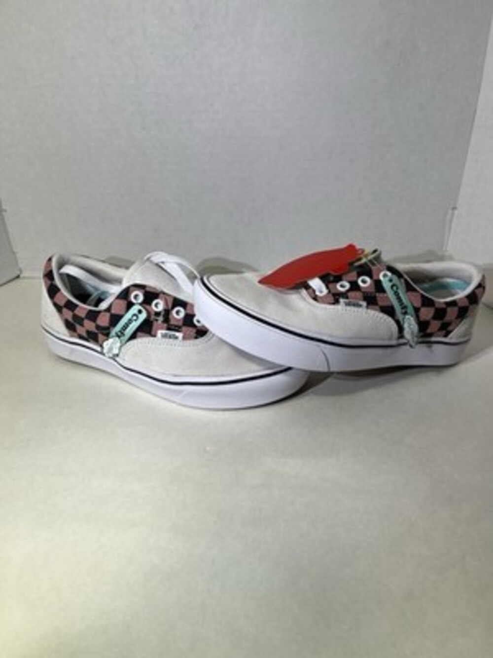 Vans Men’s Checkerboard Low-Top Sneaker in Pink and Black